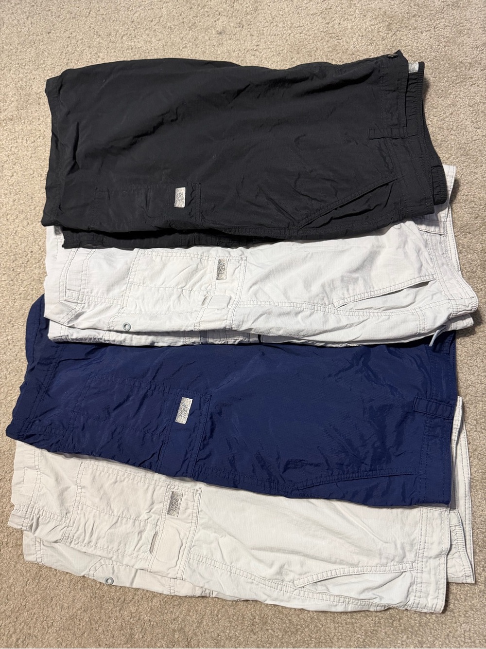 4 pairs of Men's Cargo Shorts Pack — Black, Navy, and White